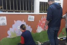 Muro de escola do Navegantes recebe pintura no Dia do Patrimônio